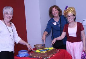 Three women with cake