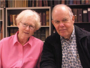 Photo of woman and man in library