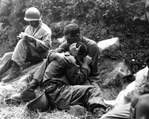 Soldier holding a fellow soldier