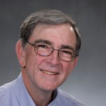 Headshot of smiling man